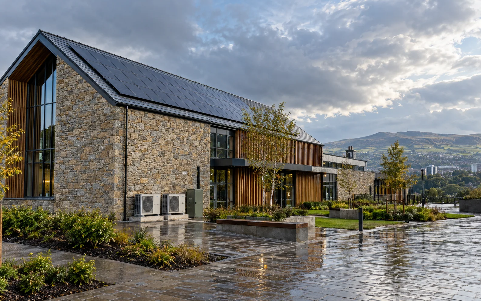 Scottish stone community building with solar panels and air source heat pumps